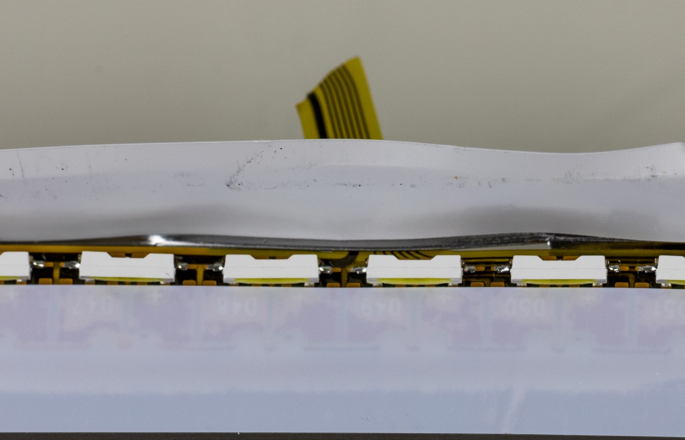 Close view of LED strip light details used to check under-cabinet runs and TV bias lighting