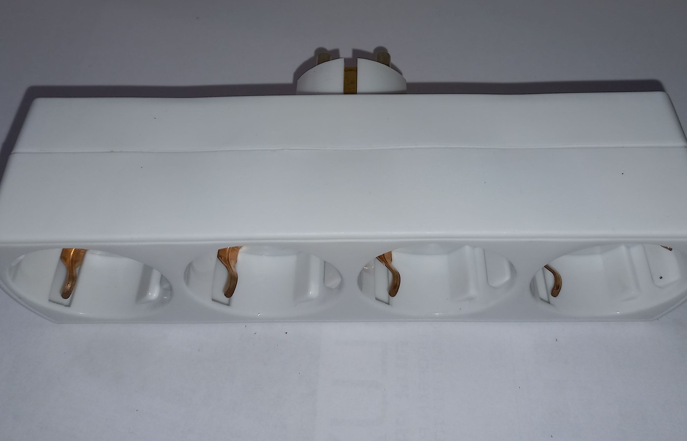 Close view of power strip or extension lead details used to check desk strips and media cabinets