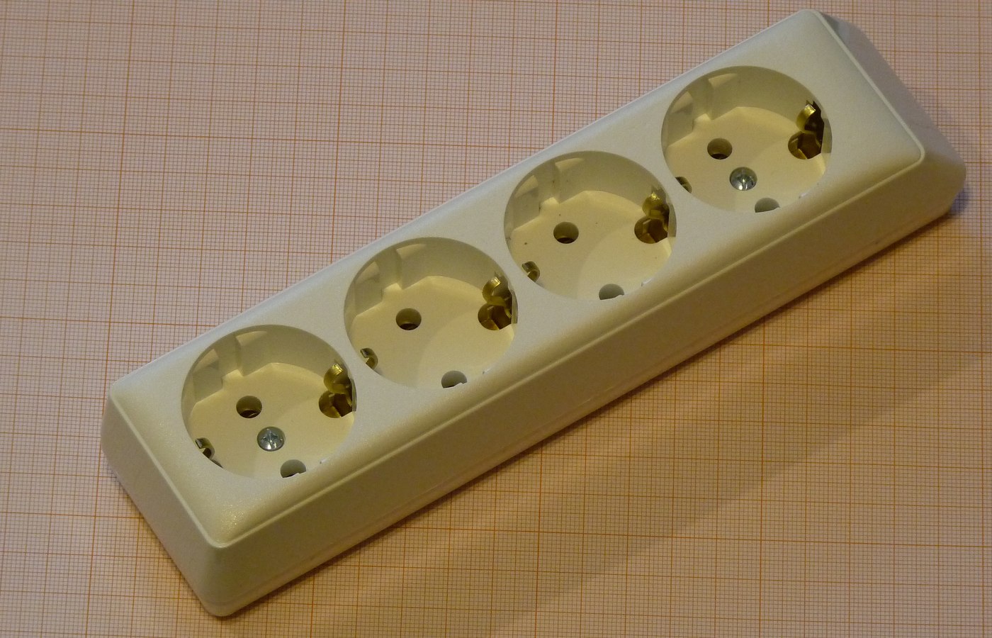 Close view of power strip or extension lead details used to check desk strips and media cabinets