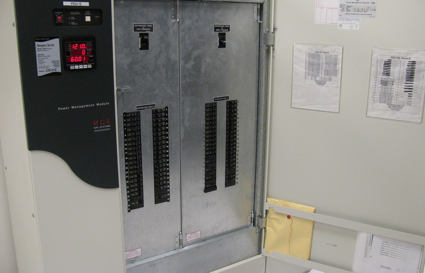 Close view of surge protector or UPS details used to check router continuity and TV and console protection