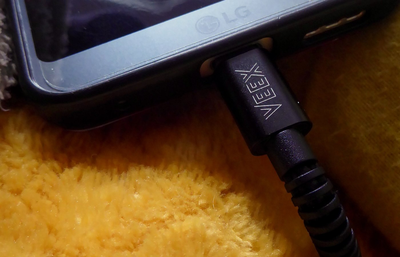 Close view of utility-room power setup details used to check tool charging and freezer monitoring