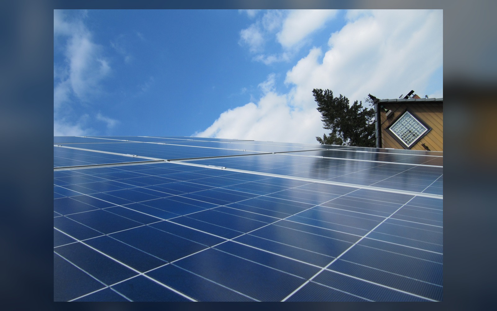 Residential rooftop solar panels supplying a home during daylight
